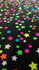 Neon Lights Stars on Nylon Spandex Fabric | (4 Way Stretch/Per Yard)