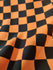 Checkerboard Print on Poly Spandex Fabric (Orange/Black) | (4 Way Stretch/Per Yard)