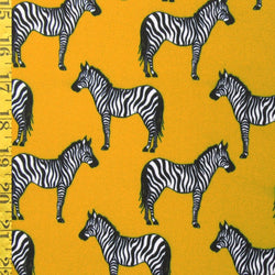 Zebra Print on Athletic Gold Poly Spandex Fabric | (4 Way Stretch/By The Yard)