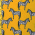 Zebra Print on Athletic Gold Poly Spandex Fabric | (4 Way Stretch/By The Yard)