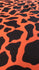 Cow Print on Nylon Spandex Fabric (Neon Orange/Black) | (4 Way Stretch/Per Yard)